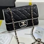 QUILTED FLAP BAG WITH WHITE TRIM 19 IN BLACK LAMBSKIN