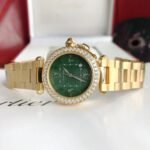 CARTIE PASHA 35MM QUARTZ GOLD CASE DIAMOND BEZEL BLUE DIAL - Image 11