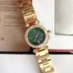 CARTIE PASHA 35MM QUARTZ GOLD CASE DIAMOND BEZEL BLUE DIAL - Image 5