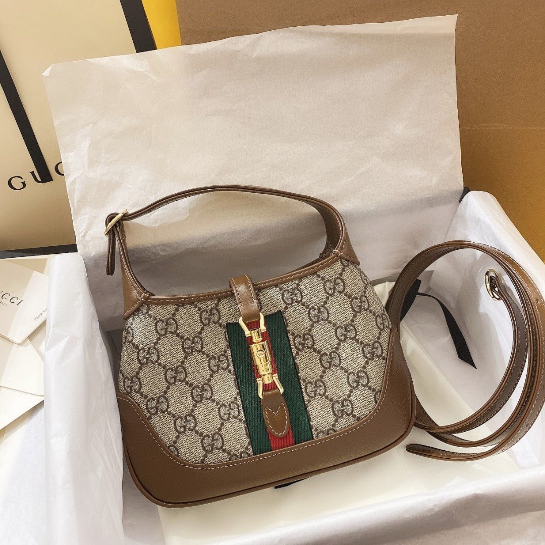 20220303_a1646316011859_0808_jpg_19a8e990-f178-4568-8425-dfc44b2206a4 JACKIE 1961 SMALL 28 SHOULDER BAG IN BEIGE CANVAS AND BROWN CALFSKIN - Image 1