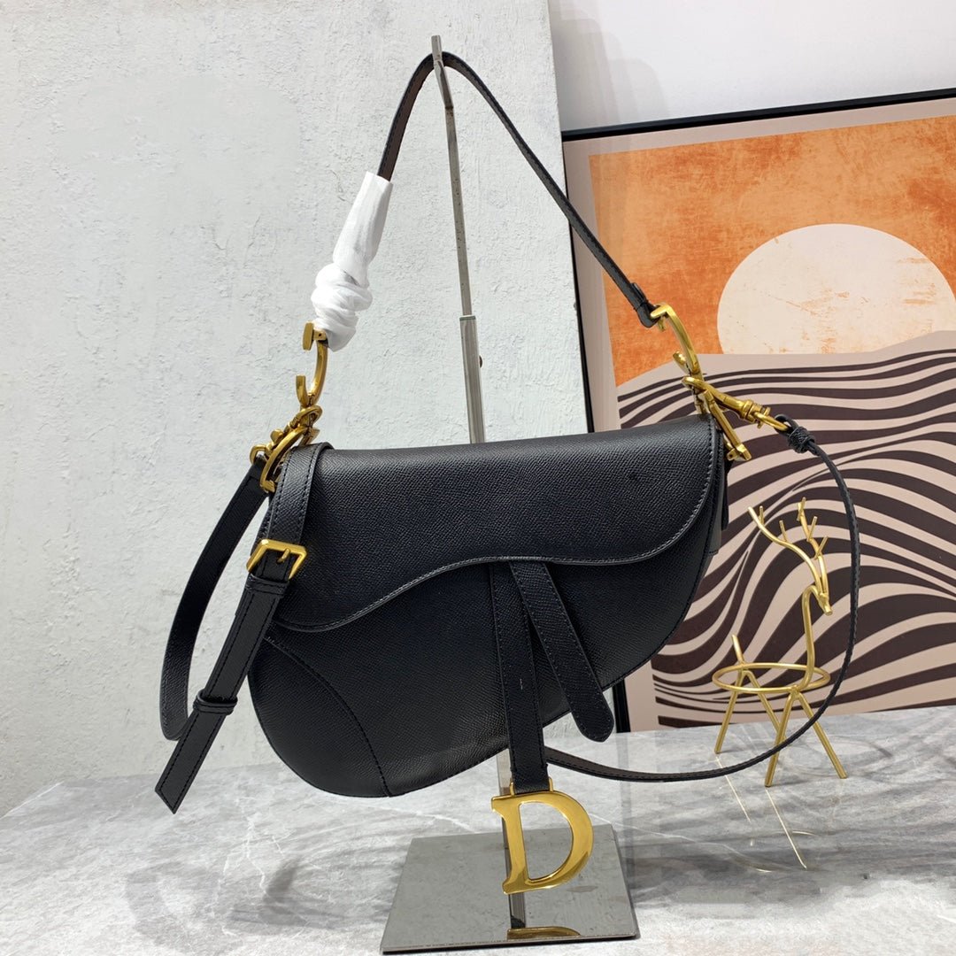 20221123_i1669217989_8079_0_jpg CD Saddle Bag Strap Warm Taupe Grained Black Calfskin - Image 1