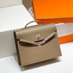 KELLY DEPECHES 34 BRIEFCASE IN ETOUPE TOGO CALFSKIN SILVER HARDWARE
