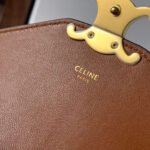 CELINE 25S WALLET MARGO 22MM IN BLACK TRIOMPHE CANVAS AND BROWN CALFSKIN - Image 6