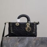 LADY D-JOY BAG 26 IN BLACK GRAPHIC CANNAGE CALFSKIN PALE GOLD-FINISH METAL CHARMS