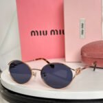 LOGO SUNGLASSES SMU52Y IN METAL - Image 11
