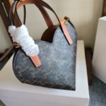 CELINE 25S TEEN COEUR BAG 19 MM IN BLACK TRIOMPHE CANVAS AND TAN CALFSKIN - Image 12