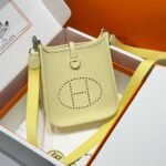 HERMES 25S MINI EVELYNE 18 IN MILTON YELLOW PATTERNED STRAP CALFSKIN SILVER HARDWARE - Image 10