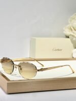 C DE RIMLESS ROUND FRAME SUNGLASSES CT0611S IN METAL - Image 12