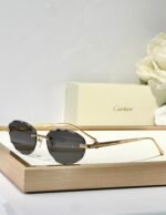 C DE RIMLESS ROUND FRAME SUNGLASSES CT0611S IN METAL - Image 6