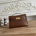 HM 26S KELLY MINI 22MM IN DARK BROWN CROC EMBOSSED CALFSKIN GOLD KELLY BUCKLE