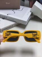 MONTAIGNE SUNGLASS 571593 IN YELLOW ACETATE TEXT LOGO - Image 2