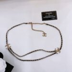 CHAIN BELT IN GOLD METAL INTERWOVEN WITH CALFSKIN STRAPS