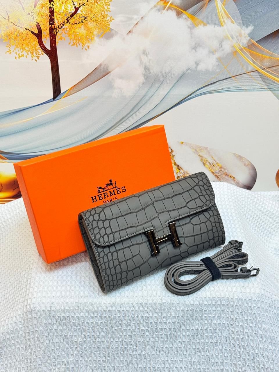 IMG-20260331-WA0029_1485c0d3-62fc-4ac5-bf9c-f1d049d06736 Hermès Constance Long To Go Wallet (Grey) - Image 1