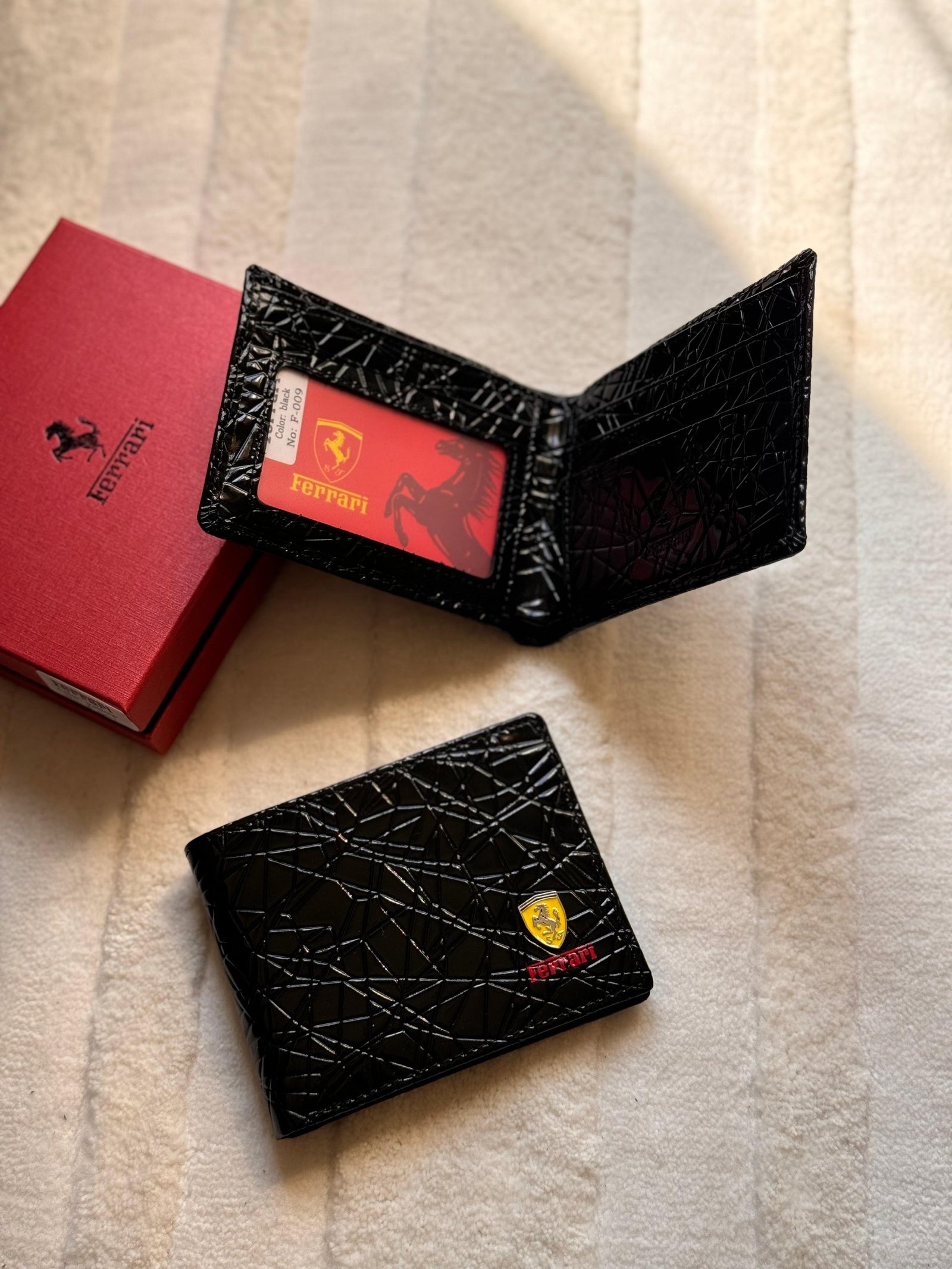 IMG-20260604-WA0124 Ferrari Cracked Pattern Leather Bi-Fold Wallet (Black) - Image 1